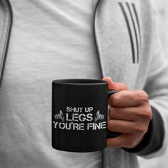 Shut up Legs You're fineIntroducing Shut Up Legs You're Fine, the perfect gift for any fitness enthusiast in your life! This 11oz black mug is a stylish and practical accessory that will he11oz Black MugslinglyMy StoreShut